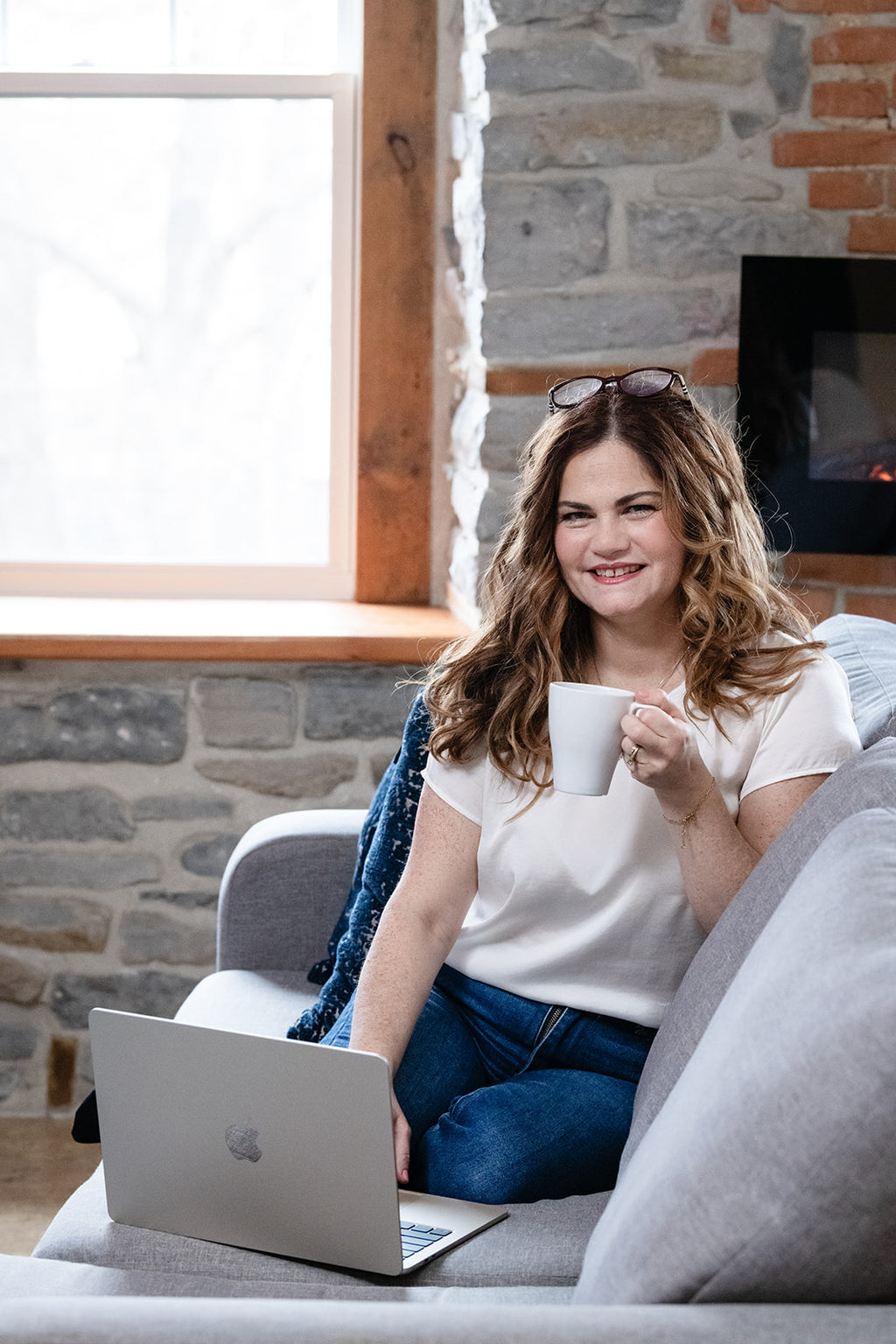 Keren, Prequelle's founder and Registered Dietitian, sitting with a coffee.